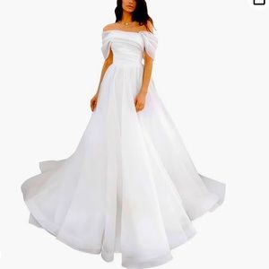 White wedding dress. Never worn. Purchased from Amazon.